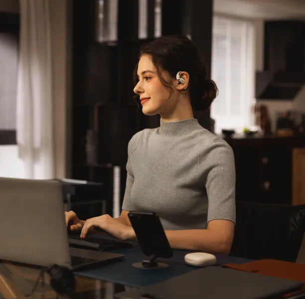 Écouteurs à oreilles libres du bureau