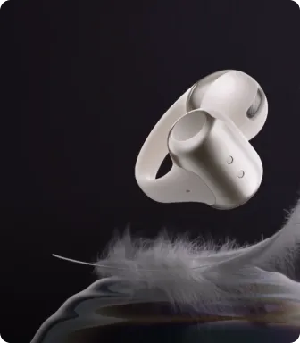 Écouteurs Shokz OpenDots ONE légers de 6,5 g avec étui compact — design confortable et portable.